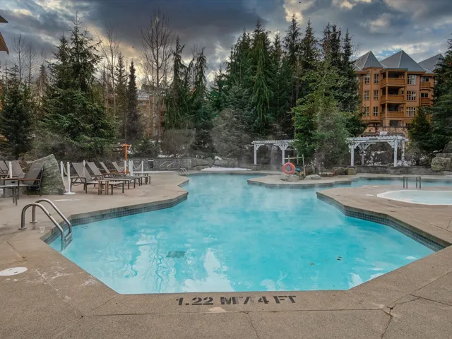 Pool featuring a pergola, a patio area, and a community hot tub
