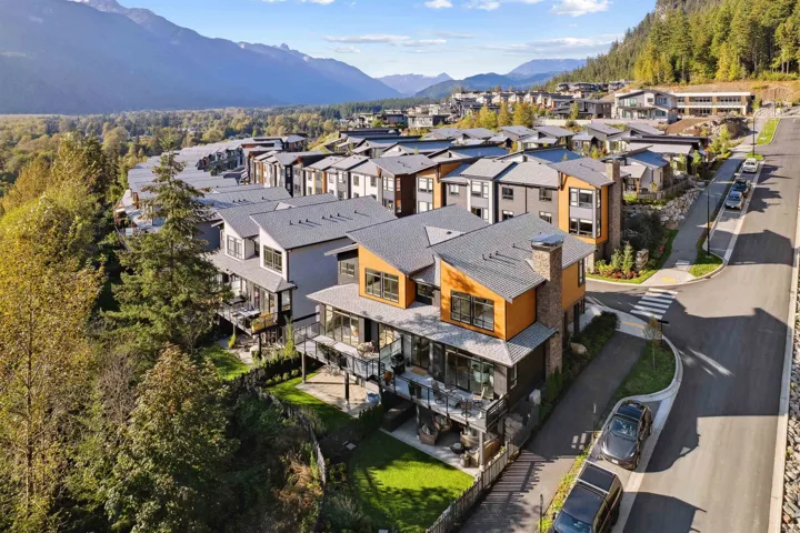 Aerial view of residential area with a mountain backdrop