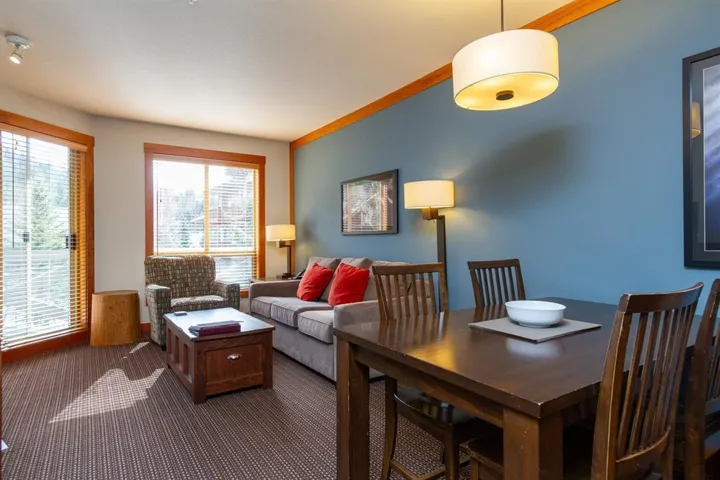 Living room with dark carpet