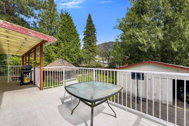 View of patio featuring area for grilling and outdoor dining space