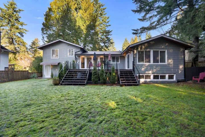 Back of property featuring stairway