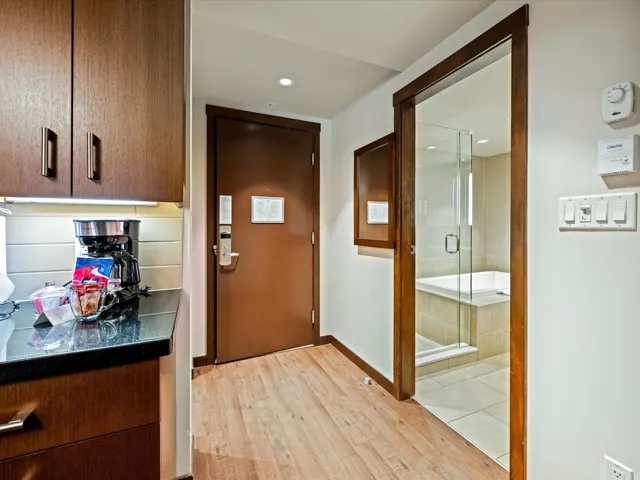 Doorway to outside featuring wood finished floors and recessed lighting