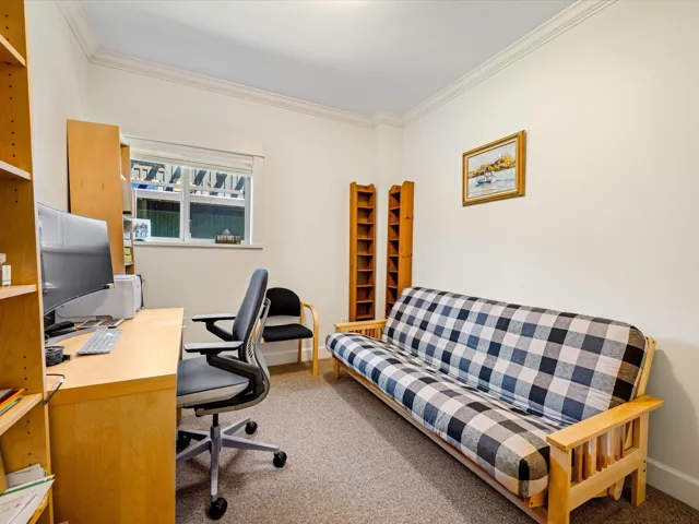 Office featuring carpet, ornamental molding, and baseboards