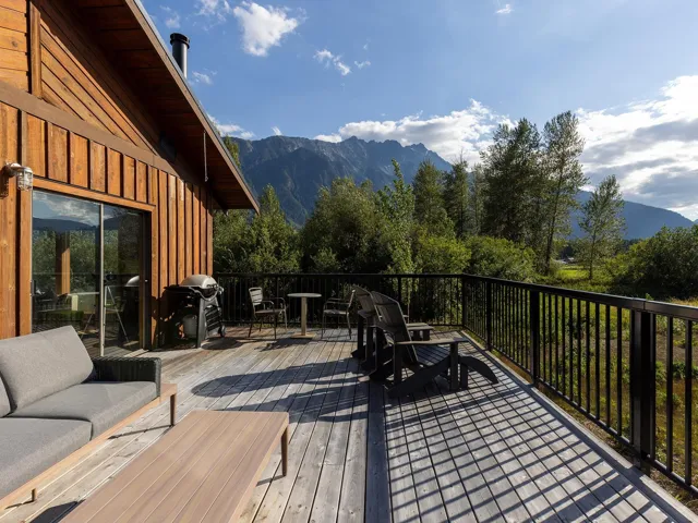 Deck featuring a mountain view and a grill