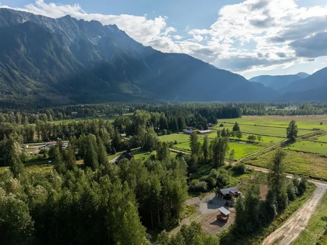Mountain view featuring a forest and rural landscape