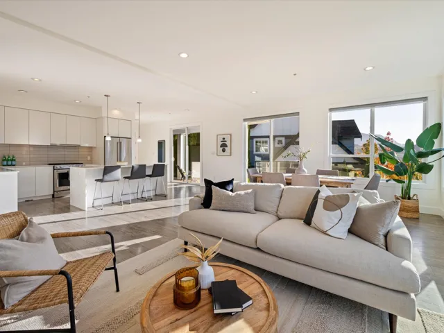 Living area with recessed lighting and light wood-style floors