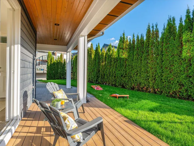 Wooden deck featuring a lawn