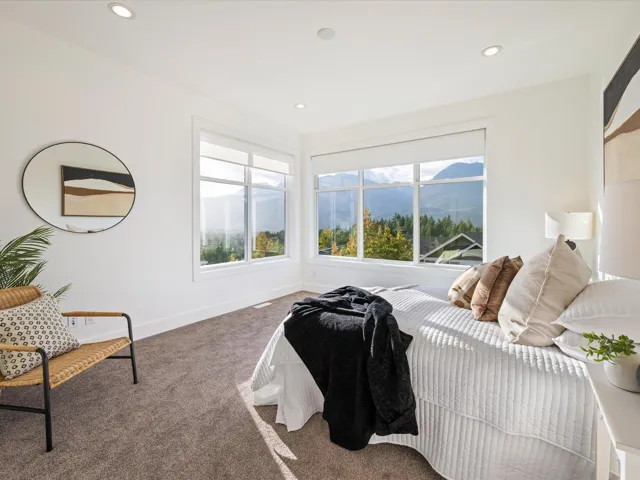 Bedroom with carpet flooring, recessed lighting, and a mountain view
