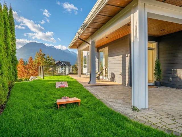 View of yard featuring a mountain view and a patio