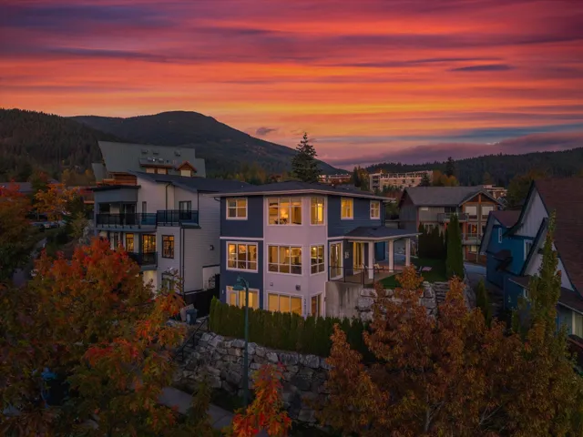 Back of property with a patio area and a mountain view