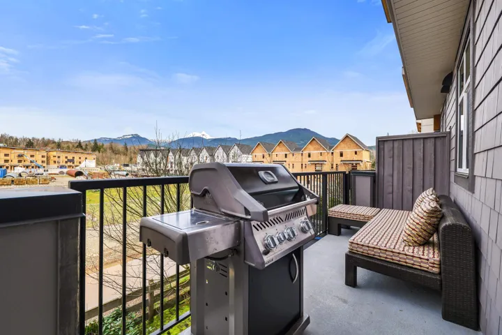 Patio / terrace featuring grilling area and a mountain view
