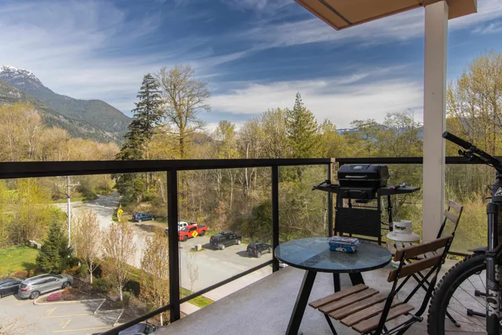 Balcony with grilling area and a mountain view
