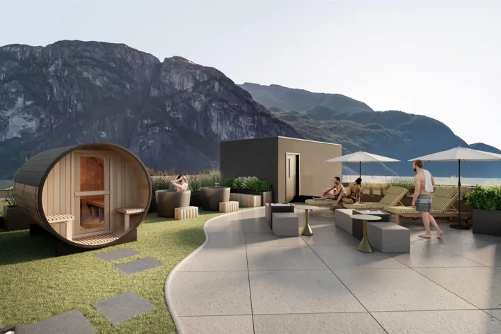 Outdoor barrel sauna with a dedicated grass area and stepping stones