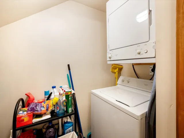 Laundry room with stacked washer / drying machine