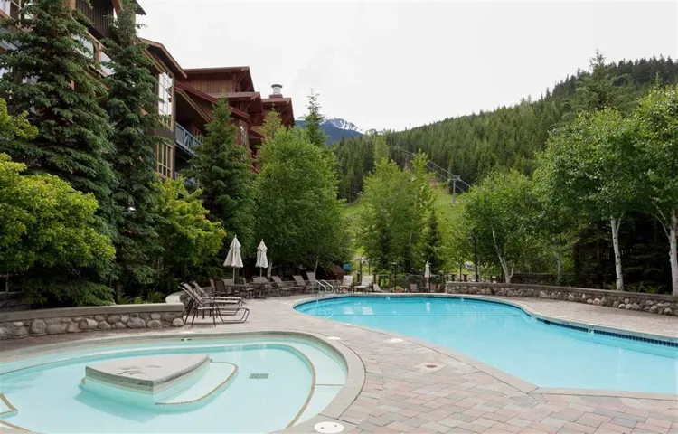 Community pool with a patio area