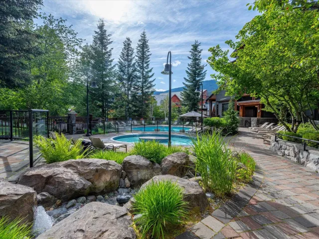 Community pool featuring a patio area