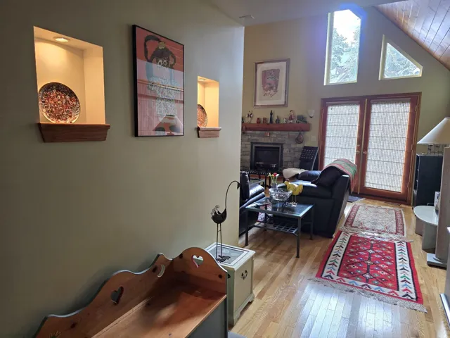 Reverse view towards Living Room and stone fireplace