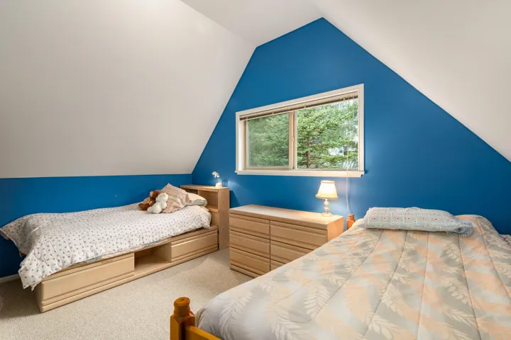 Upper Floor Bedroom with light tone carpet