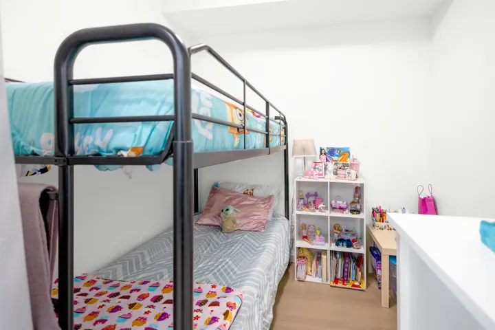 Bedroom with light wood finished floors