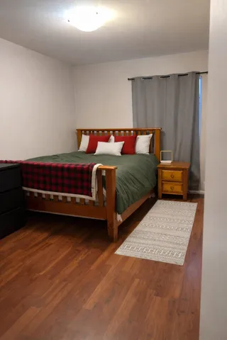 Bedroom featuring wood finished floors