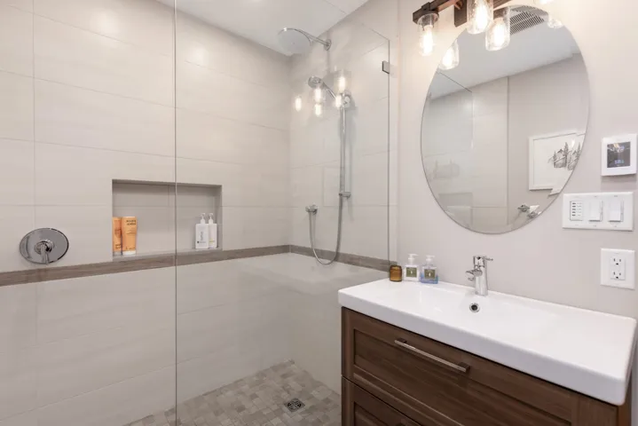 Bathroom featuring vanity and walk in shower