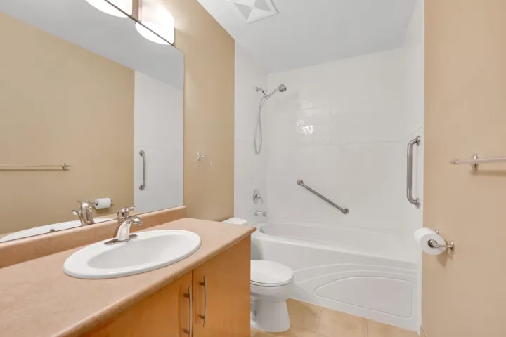 Lower level bathroom with tub and shower