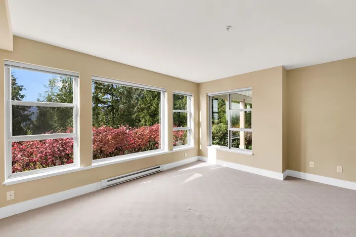 lower level bedroom with private forest views.