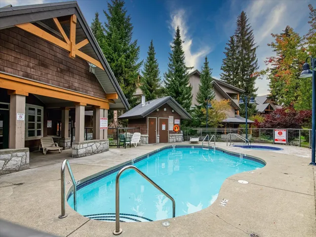 Community pool featuring a patio area