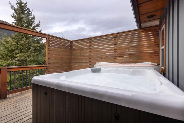 Deck featuring a hot tub