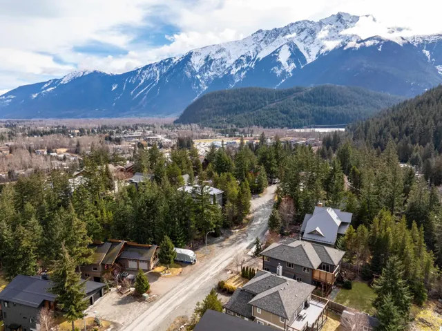Exterior space with a forest view and a mountain view