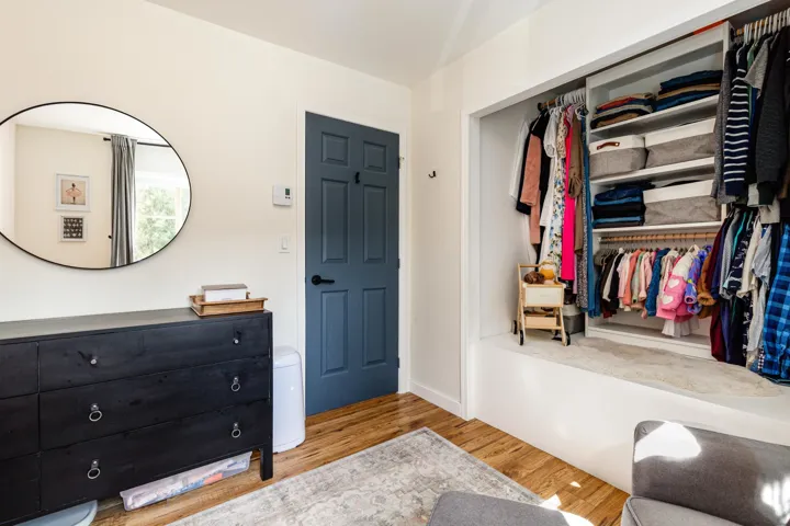 Interior space featuring a closet and wood finished floors