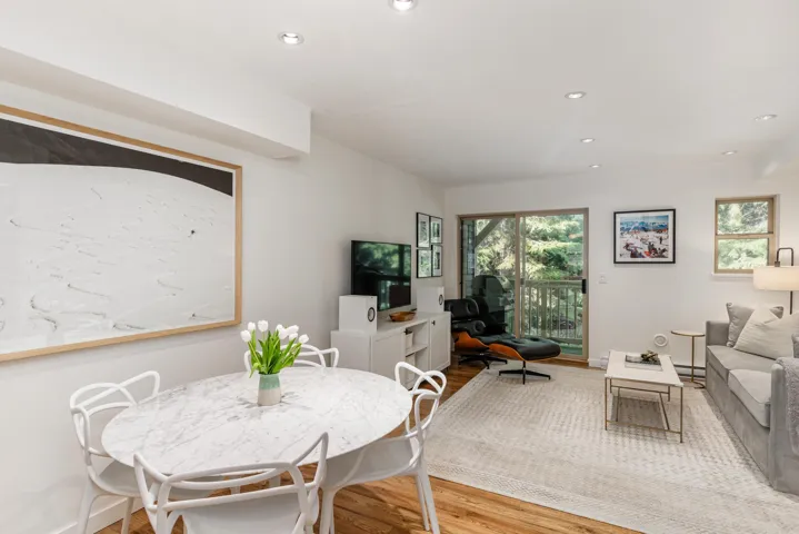 Dining space featuring wood finished floors, recessed lighting, and baseboards