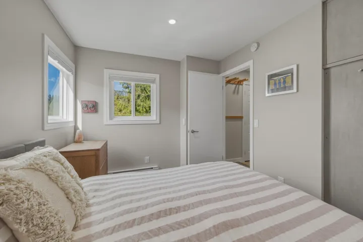 Room featuring light gray painted walls and white trim