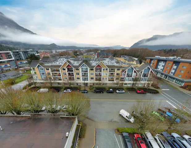 Drone / aerial view featuring a mountain view and a residential view