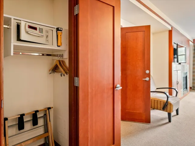Hallway with carpet floors