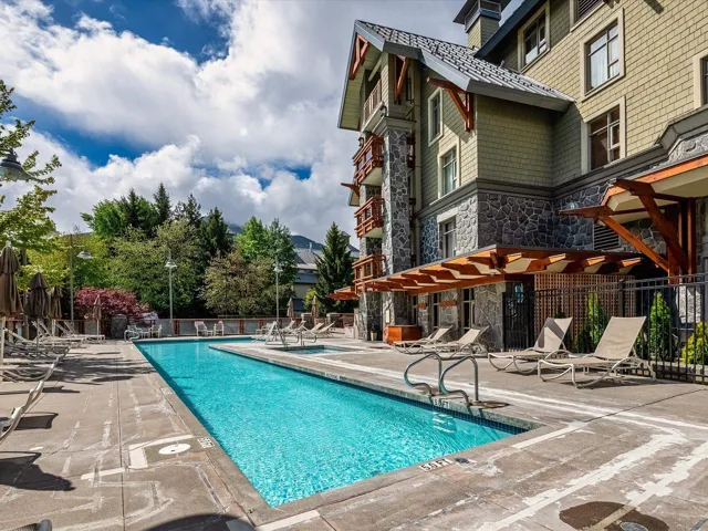 Pool featuring a patio area and fence