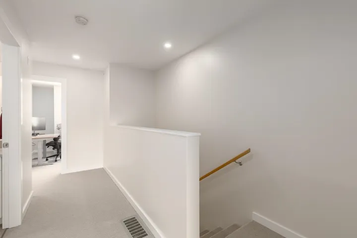 Corridor featuring an upstairs landing, baseboards, recessed lighting, carpet, and an office area