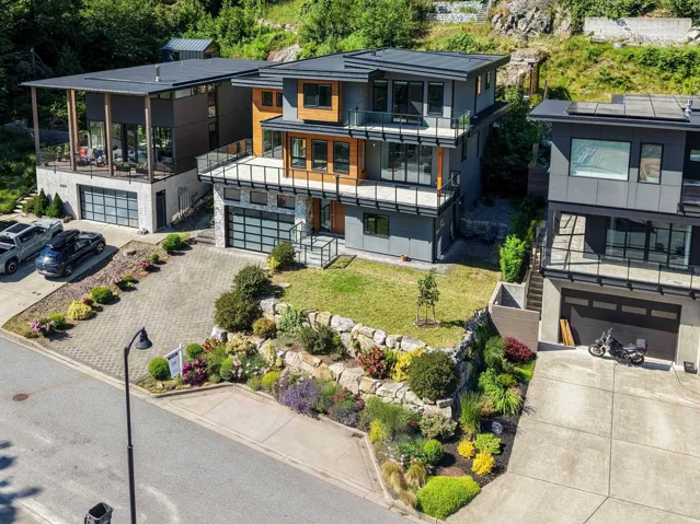 Modern multi-level residence featuring sleek lines and a contemporary facade