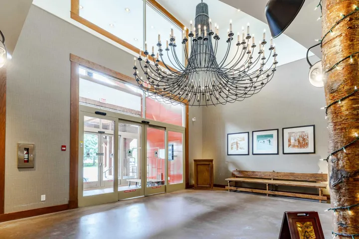 Community lobby featuring a towering ceiling