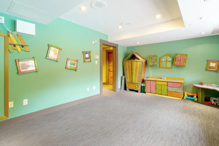 Rec room featuring carpet floors, recessed lighting, and attic access