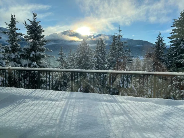 Wooden terrace featuring a mountain view
