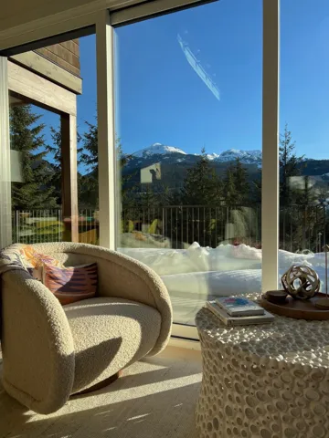 Sunroom with a mountain view
