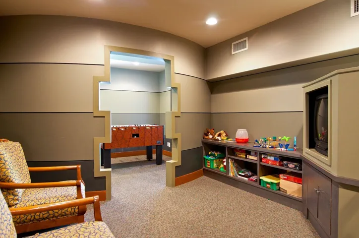 Playroom with light carpet and recessed lighting