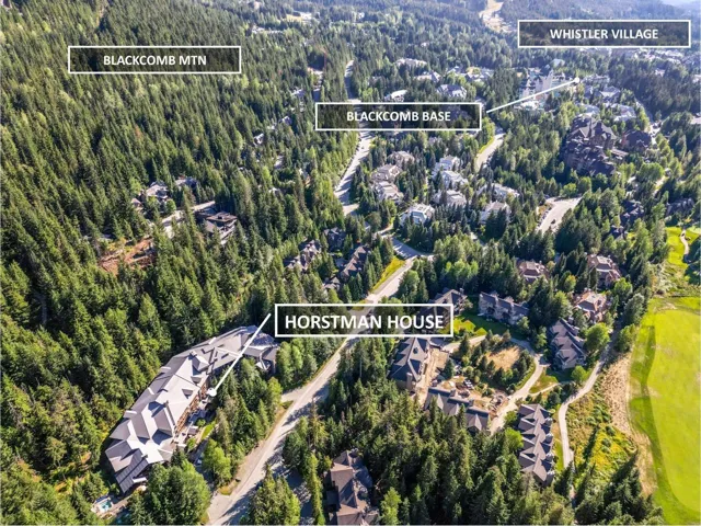 Aerial overview of property's location featuring nearby suburban area and property parcel outlined