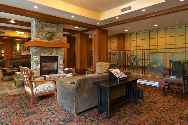 Community lobby featuring recessed lighting and beamed ceiling
