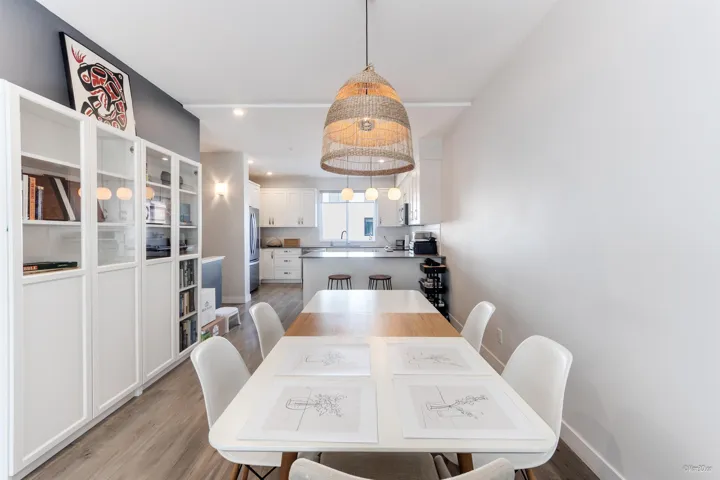 Dining room featuring light wood-style floors and recessed lighting