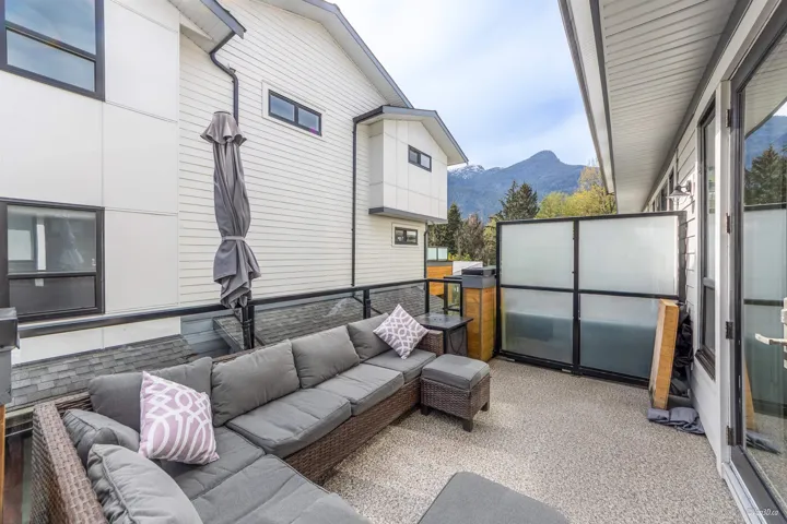 View of patio featuring a mountain view and an outdoor living space