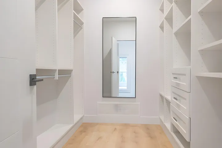 AI removed belongings.  Closet not exactly as shown. Consider photo for rending purposes only.