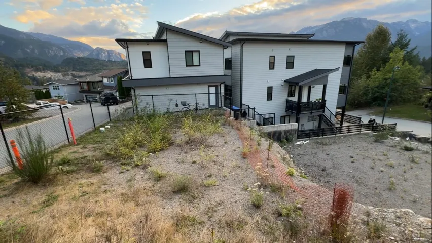 Back of house with a mountain view