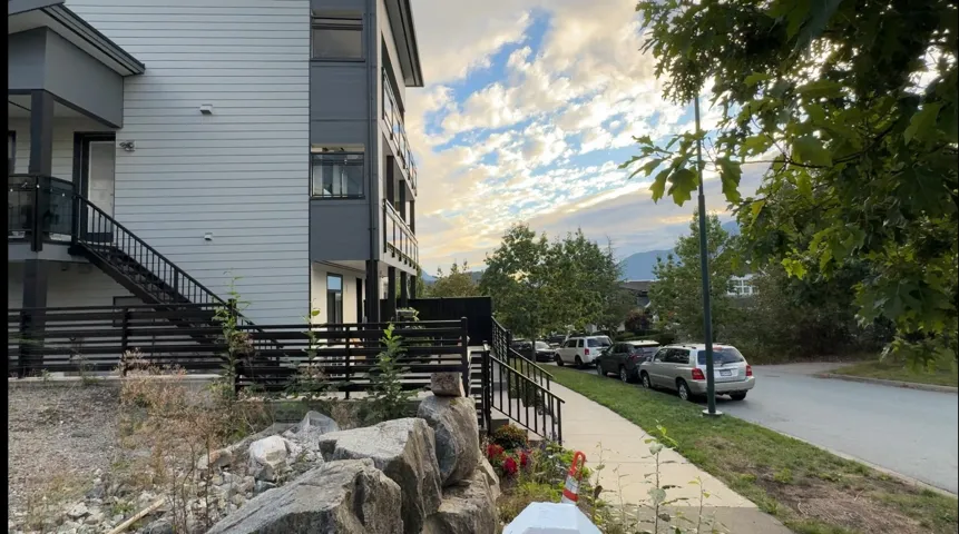 View of home's exterior featuring stairway